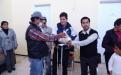 Entrega de bastón plegadizo y despensas