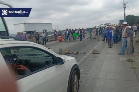 Ante la falta de pago de sus propiedades, campesinos bloquean el Arco Norte