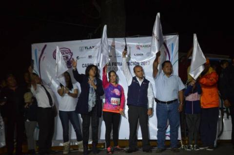 Fiesta y tradición en la Carrera Nocturna de la Feria de Tlaxcala imagen 6