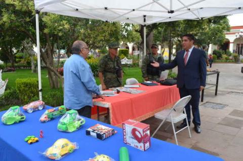 Alcalde de Calpulalpan hace llamado a la Población para sumarse al canje de armas 2015 imagen 3