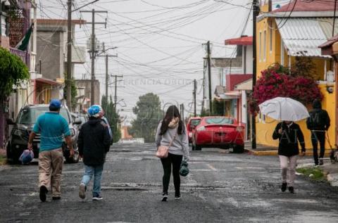 ¡ A sacar sombrillas ! Llovizna en la ciudad