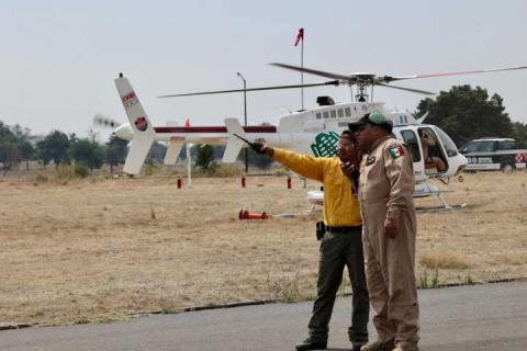Combate a incendio en Atltzayanca alcanza un 100% de territorio bajo control y 80% de liquidación imagen 1