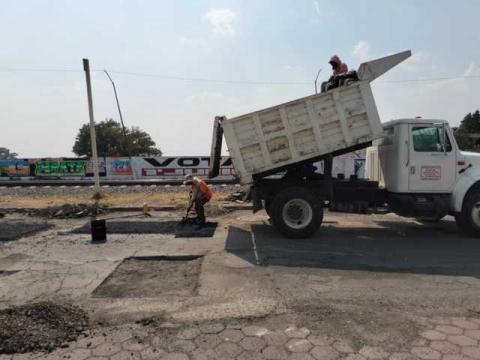 Se continúan realizando labores de bacheo en Chiautempan imagen 1