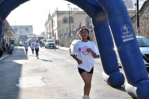 Con éxito y unidad, concluye carrera conmemorativa del 8M en Tlaltelulco imagen 1